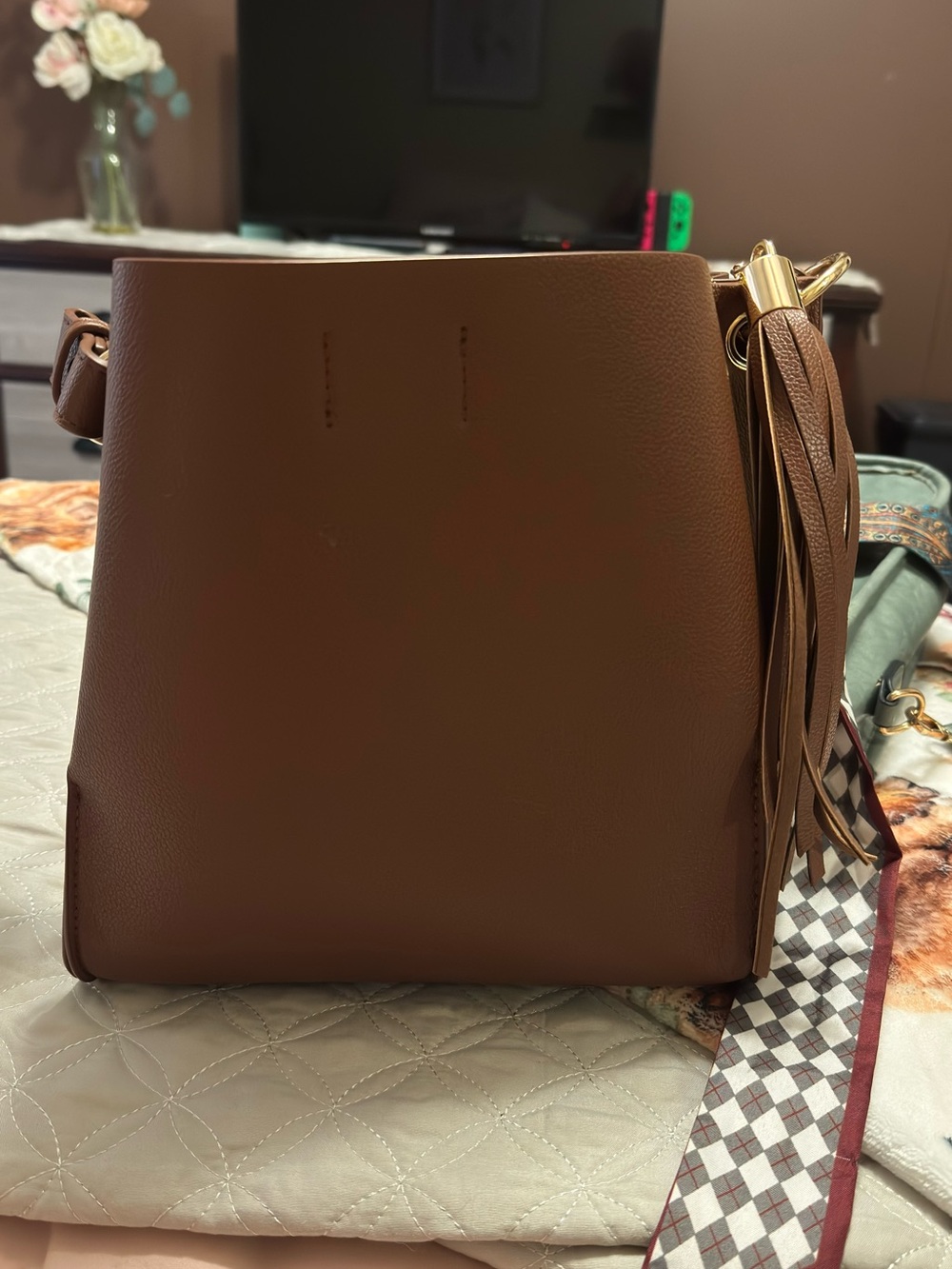 Brown Leather Bucket Shoulder Bag with Tassel Accent
